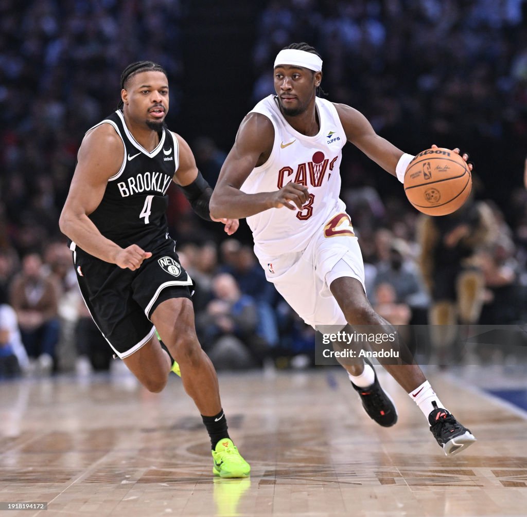 Caris LeVert (R) of Cleveland Cavaliers in action against Dennis Smith Jr. (L) of Brooklyn Nets during the Paris Game 2024 match between Brooklyn Nets and Cleveland Cavaliers at Accor Arena in Paris, France on January 11, 2024. (Photo by Mustafa Yalcin/Anadolu via Getty Images)