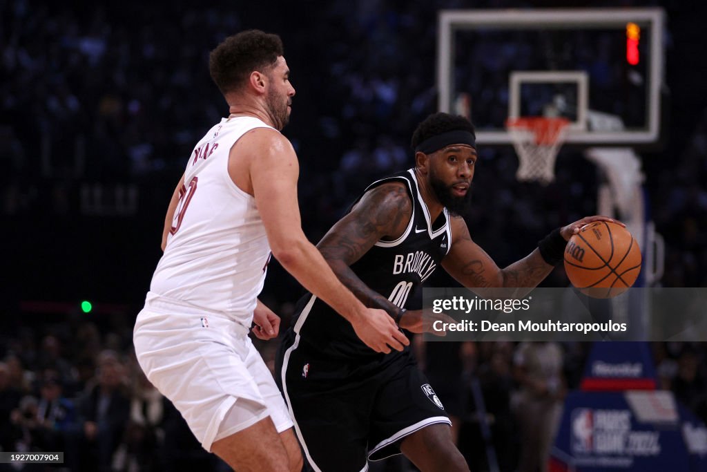 Royce O'Neale of Brooklyn Nets runs at Georges Niang of Cleveland Cavaliers during the NBA match between Brooklyn Nets and Cleveland Cavaliers at The Accor Arena on January 11, 2024 in Paris, France. (Photo by Dean Mouhtaropoulos/Getty Images)