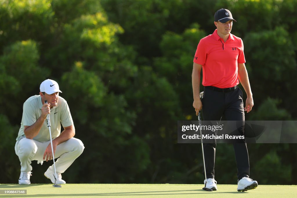 Scottie Scheffler of the United States and Jordan Spieth of the United States look on from the 18th green during the first round of The Sentry at Plantation Course at Kapalua Golf Club on January 04, 2024 in Kapalua, Hawaii. (Photo by Michael Reaves/Getty Images)