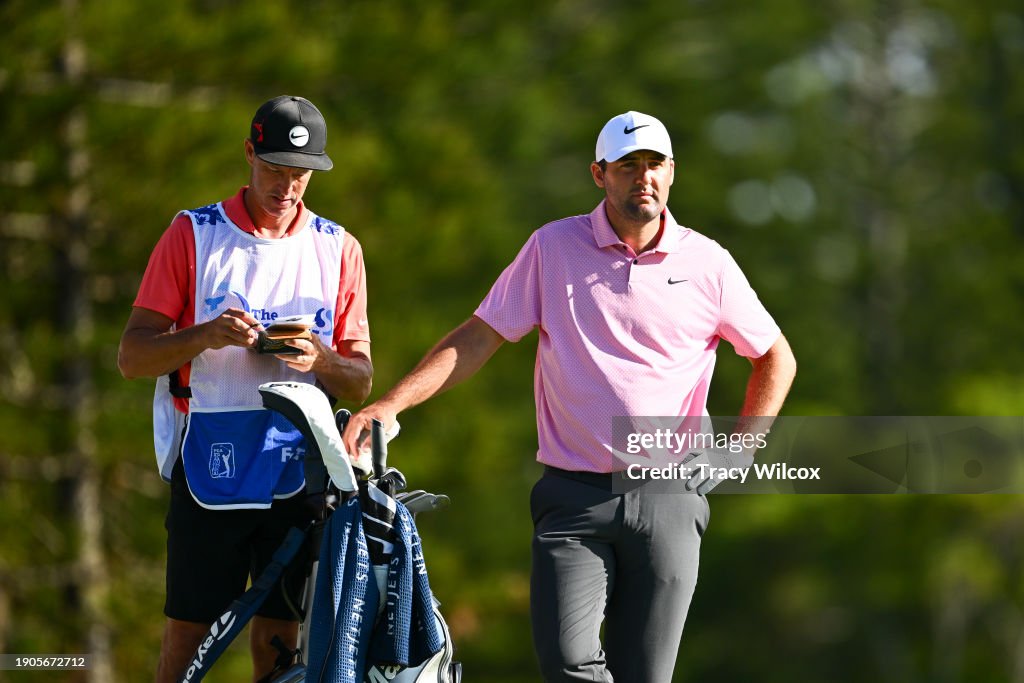 Scottie Scheffler with his caddie Ted Scott on the second tee during the third round of The Sentry at The Plantation Course at Kapalua on January 6, 2024 in Kapalua, Maui, Hawaii. (Photo by Tracy Wilcox/PGA TOUR via Getty Images)
