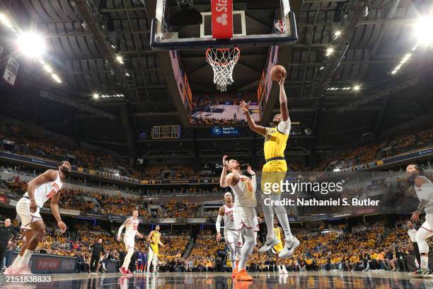 Indiana's Myles Turner dunks a basket over Donte DiVincenzo of the New York Knicks in Game 3 of the NBA Playoff semi finals | Photo: Getty Images