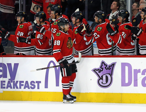 Patrick Kane #88 of the Chicago Blackhawks is congratulated by teammates after scoring a goal in the first period against the St. Louis Blues at the United Center on November 4, 2015 in Chicago, Illinois. (Nov. 3, 2015 - Source: Jonathan Daniel/Getty Images North America)