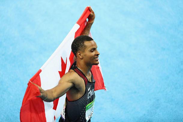 Andre De Grasse celebrates winning the silver medal in the 200 metres in Rio last summer (Getty/Paul Gilham)
