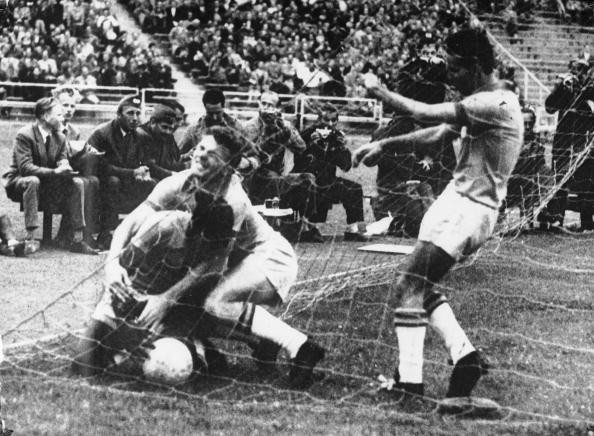 Pele celebrates his goal against Wales in 1958 | Photo by Geoff BruceCentral PressHulton ArchiveGetty Images