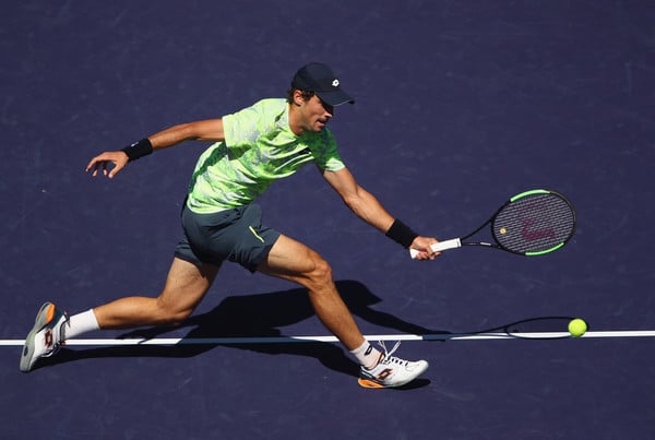 Guido Pella lunges for a forehand during his second round loss. Photo: Clive Brunskill/Getty Images