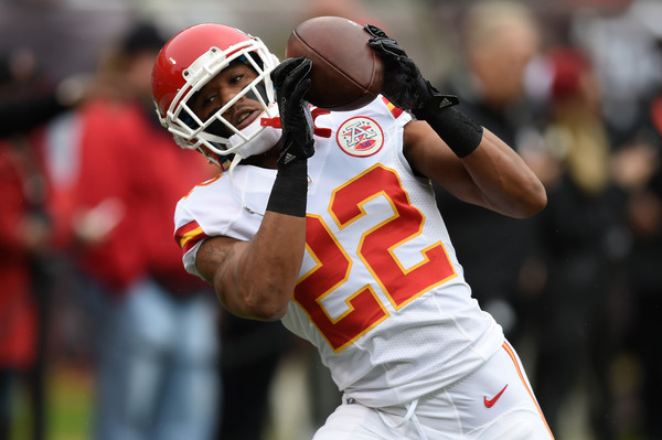 Marcus Peters warms up before his game against the Oakland Raiders