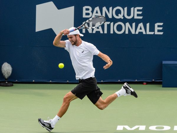 Philip Bester hits a forehand during his first round qualifying match at the 2015 Rogers Cup. | Photo: Minas Panagiotakis/Getty Images North America