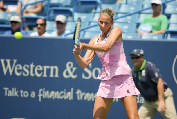 Karolina Pliskova crushes one of her big backhands during the win over Radwanska. Photo: Noel Alberto/VAVEL USA