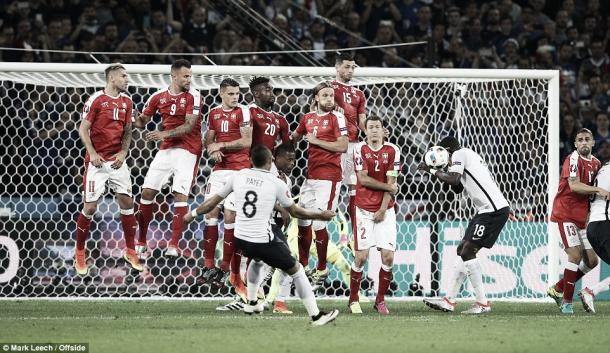 Above: Switzerland defending a  Dimitri Payet free-kick in their 0-0 draw with France | Photo: Matt 