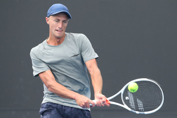 Peter Polansky hits a backhand during his first round match at the Australian Open. Photo: Pat Scala/Getty Images