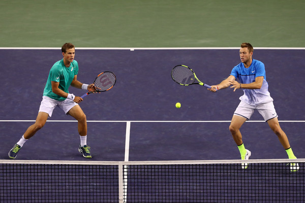 Pospisil (left) and Sock in action in Indian Wells. Photo: Julian Finney/Getty Images