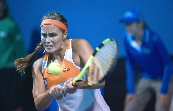 Monica Puig during her epic win in round two. Photo: Paul Crock/AFP/Getty Images