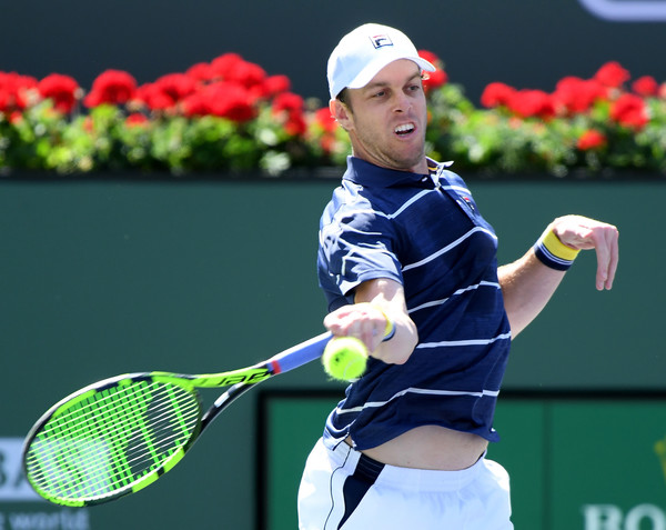Sam Querrey crushes one of his giant forehands during his loss to Raonic. Photo: Harry How/Getty Images