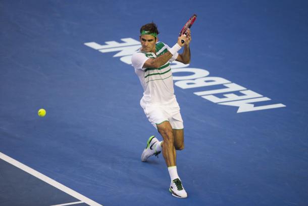 Federer slices a backhand return at the 2016 Australian Open. Credit: REX/Shutterstock