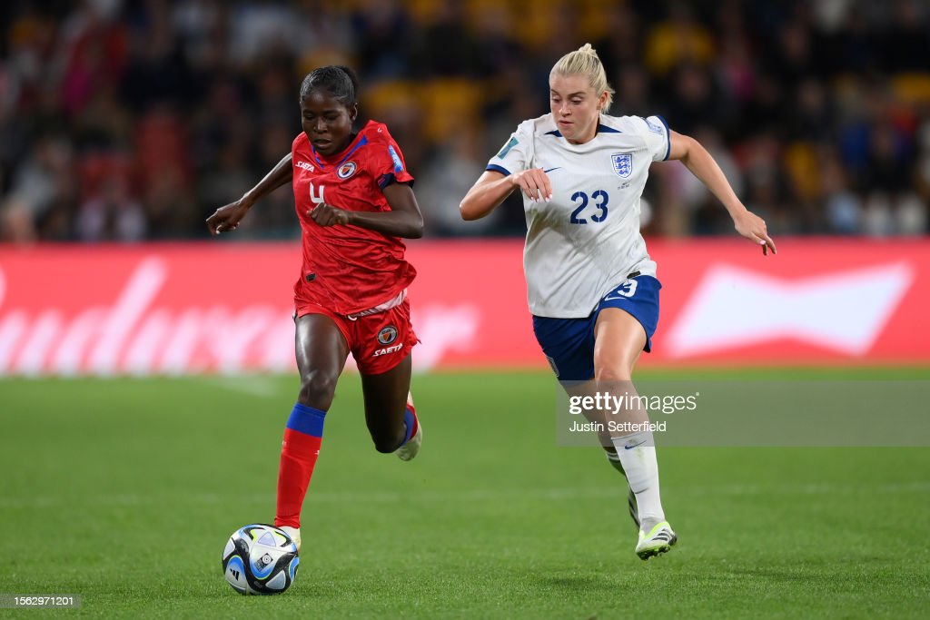 Tabita Joseph of Haiti takes on Alessia Russo of England during the FIFA Women's <strong><a  data-cke-saved-href='https://www.vavel.com/en/football/2023/06/09/1148811-inzaghis-and-inters-chance-to-write-history.html' href='https://www.vavel.com/en/football/2023/06/09/1148811-inzaghis-and-inters-chance-to-write-history.html'>World Cup</a></strong> Australia & New Zealand 2023 Group D match between England and Haiti at Brisbane Stadium on July 22, 2023 in Brisbane, Australia. (Photo by Justin Setterfield/Getty Images)