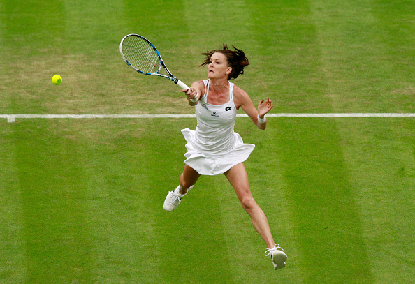 Radwanska hits a swinging forehand volley during her first round win. Photo: Adam Pretty/Getty Images