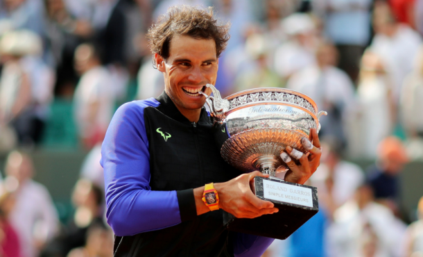 Rafael Nadal won five majors in the inter-Federer period, including this historic 10th French Open title. Photo: Adam Pretty/Getty Images