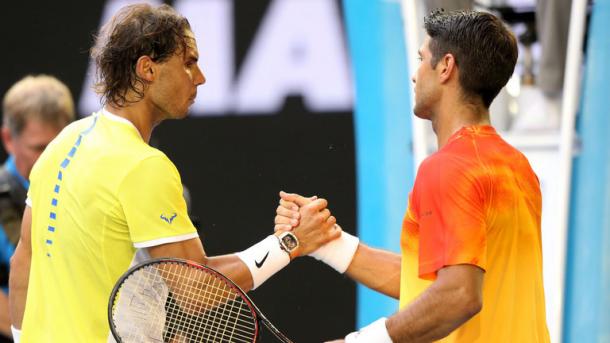 Nadal shakes hands with Verdasco after their first round encounter / Michael Dodge, Getty Images