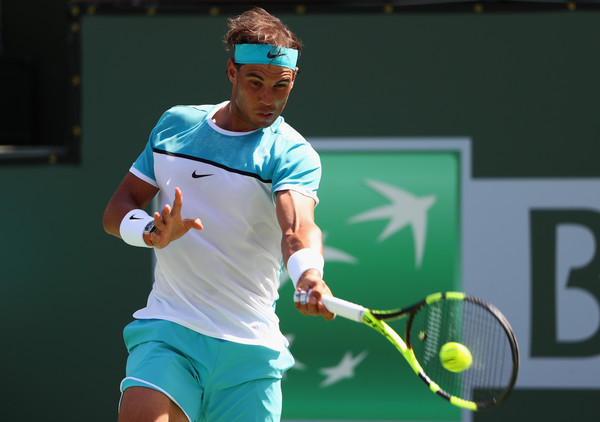 When he makes contact with the ball, Nadal's strings result into a nearly perfectly vertical racquet face. | Photo: Julian Finney/Getty Images North America