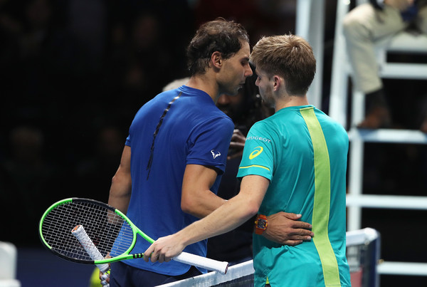Rafael Nadal and David Goffin meets at the net after the match | Photo: Julian Finney/Getty Images Europe