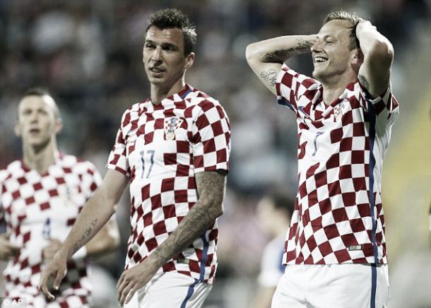 Above: Mario Mandzukic and Ivan Rakitic reacting to a rare miss in Croatia's 10-0 win over San Marino | Photo: AP