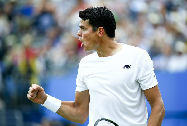 Milos Raonic celebrates winning the first set of the Queen's Club final. Photo: Jordan Mansfield/Getty Images