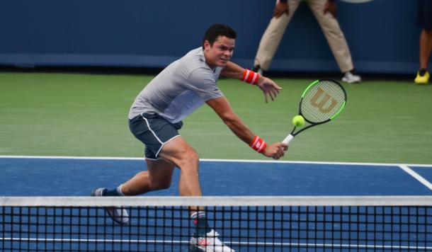 Milos Raonic sneaks in for a volley during his quarterfinal loss. Photo: Noel Alberto/VAVEL USA