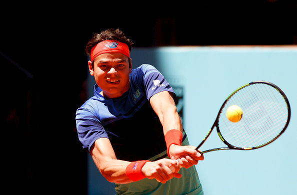 Milos Raonic crushes a backhand during his victory. Photo: Guillermo Martinez/Corbis via Getty Images