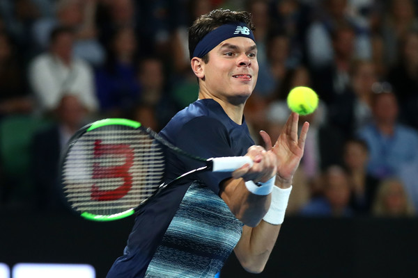 Raonic tees off on a forehand back at the Australian Open. Photo: Cameron Spencer/Getty Images