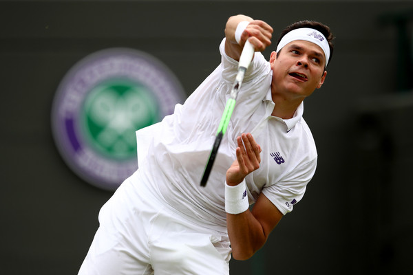 Raonic serves on Tuesday at Wimbledon. Photo: Julian Finney/Getty Images