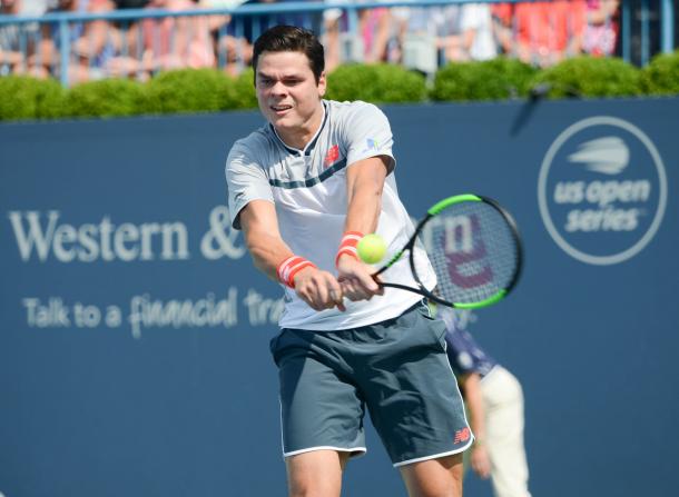 Milos Raonic strikes a backhand during his round one win. Photo: Noel Alberto/VAVEL USA