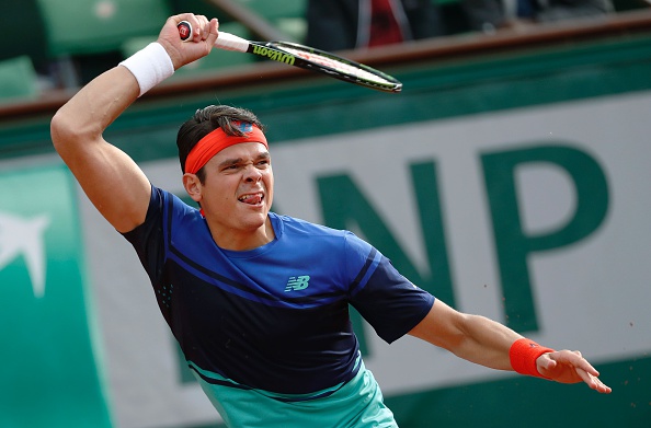 Raonic follows through on a forehand during the second round win. Photo: Thomas Samson/AFP/Getty Images