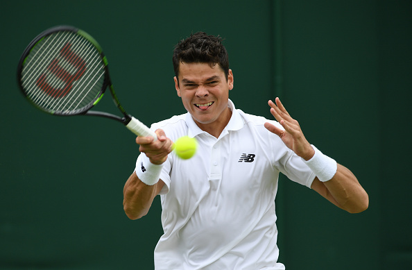 Raonic crushes a forehand on Thursday at Wimbledon. Photo: Shaun Botterill/Getty Images