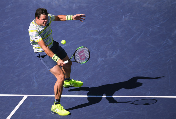 Milos Raonic hits a volley during the Indian Wells semifinal, where he struggled to keep the ball in play. Photo: Harry How/Getty Images