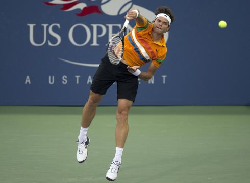 Raonic unleashes a big serve at the 2014 US Open. Photo: Susan Mullane/USA Today