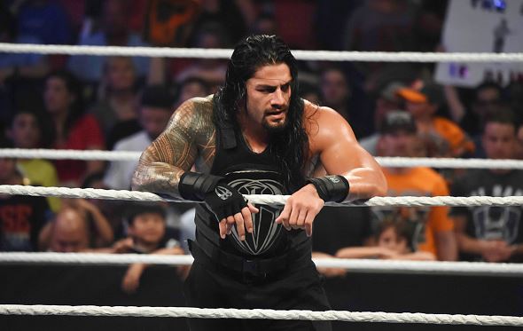 Roman Reigns looks on during the WWE Smackdown on September 1, 2015 at the American Airlines Arena in Miami, Florida. (Photo by Ron ElkmanSports Imagery/Getty Images