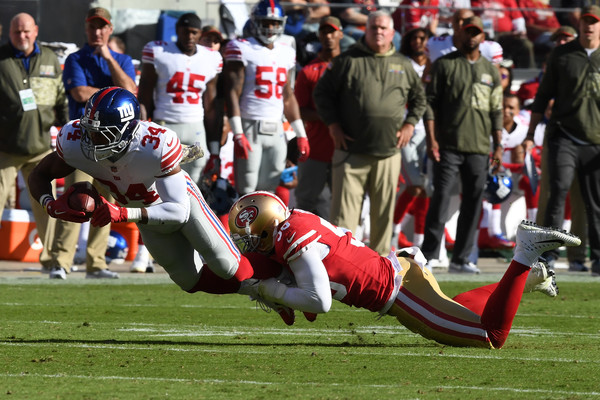 Shane Vereen #34 of the New York Giants is tackled by Reuben Foster #56 of the San Francisco 49ers. |Thearon W. Henderson/Getty Images North America|