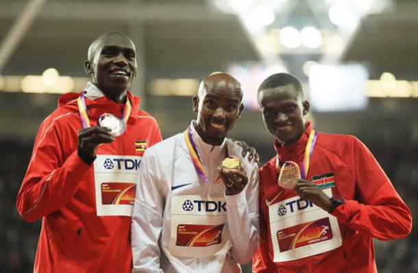 Cheptegei, Farah, and Tanui after receiving their medals (Getty/Richard Heathcote)