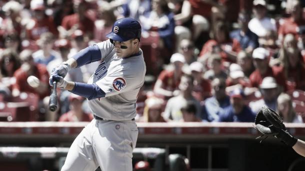 Anthony Rizzo hits a two run homer in the first inning of April 24ths game against the Reds (AP Photo/John Minchillo)