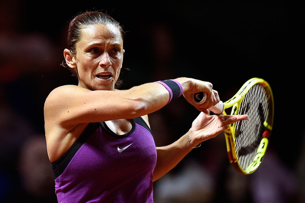 Roberta Vinci follows through on a forehand during her first round match at the 2016 Porsche Tennis Grand Prix. | Photo: Dennis Grombkowski/Bongarts