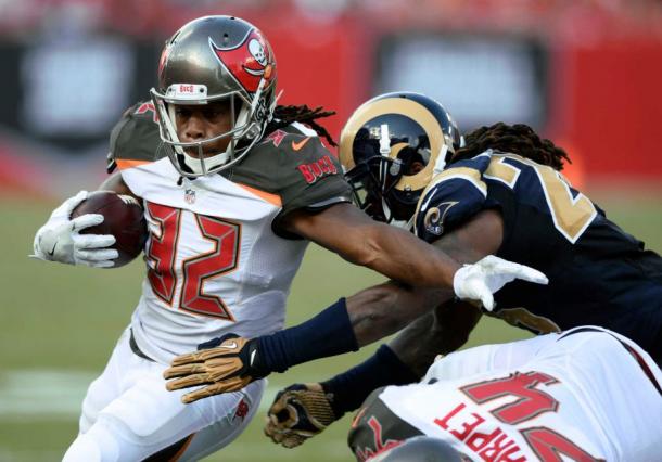 Jacquizz Rodgers (left) suffered a sprained foot in last week's overtime loss to the Oakland Raiders | Source: Jason Behnken - AP Photo