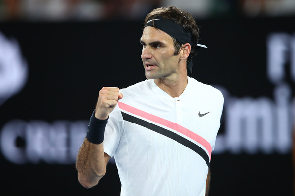 Roger Federer celebrates after winning a point against Marin Cilic during the final of the 2018 Australian Open. | Photo: Mark Kolbe/Getty Images