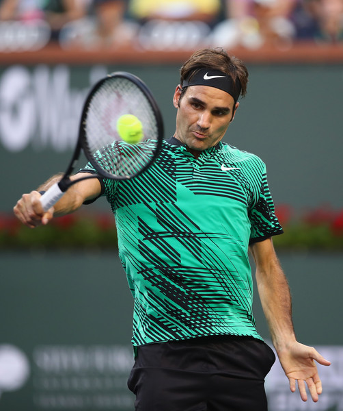 Roger Federer hits a backhand during his straight-sets victory over Rafael Nadal in the fourth round of the 2017 BNP Paribas Open. | Photo: Clive Brunskill/Getty Images