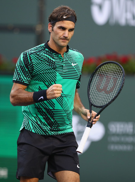 Roger Federer celebrates after winning a point during his straight-sets victory over Rafael Nadal in the fourth round of the 2017 BNP Paribas Open. | Photo: Clive Brunskill/Getty Images