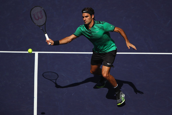 Roger Federer hits a forehand volley during his straight-sets victory over Jack Sock in the semifinals of the 2017 BNP Paribas Open. | Photo: Clive Brunskill/Getty Images