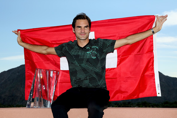 Federer celebrates his success in the Californian desert (Photo: Matthew Stockman/Getty Images North America)