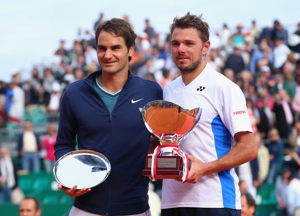 Roger Federer and Stan Wawrinka pose with their trophies after meeting in the final of the 2014 Monte-Carlo Rolex Masters. | Photo: Julian Finney/Getty Images