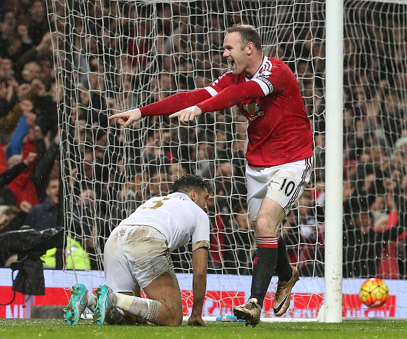 Wayne Rooney celebrates scoring against Swansea City