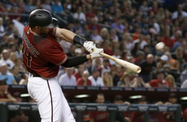 Goldschmidt connects on a fastball from Luis Perdomo and drives it out of the park-Ross D Franklin AP