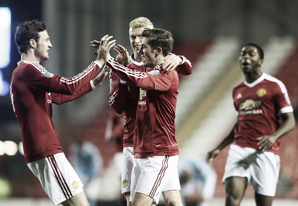 Will Keane celebrates with Joe Rothwell in the u21 Manchester derby on Thursday | Photo: John Peters/Manchester United